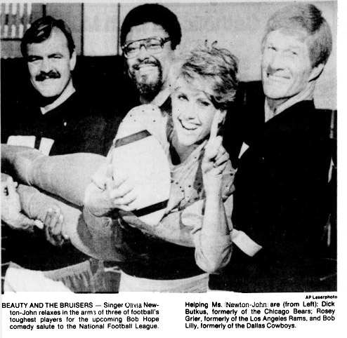 Beauty and the bruisers (Olivia in Bob Hope comedy salute to NFL) - Desert Sun