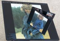 The Clearly Love mini gatefold LP set next to the original vinyl LP