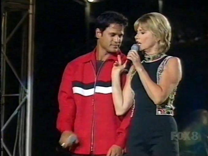 Olivia Newton-John and Jon Stevens at Super League Cup Grand Final September 1997 Olivia Newton-John Super League Cup Grand Final September 1997