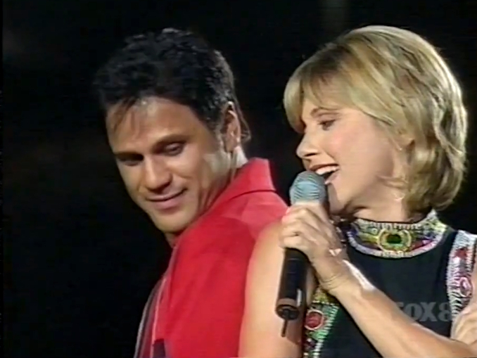Olivia Newton-John and Jon Stevens at Super League Cup Grand Final September 1997 Olivia Newton-John Super League Cup Grand Final September 1997