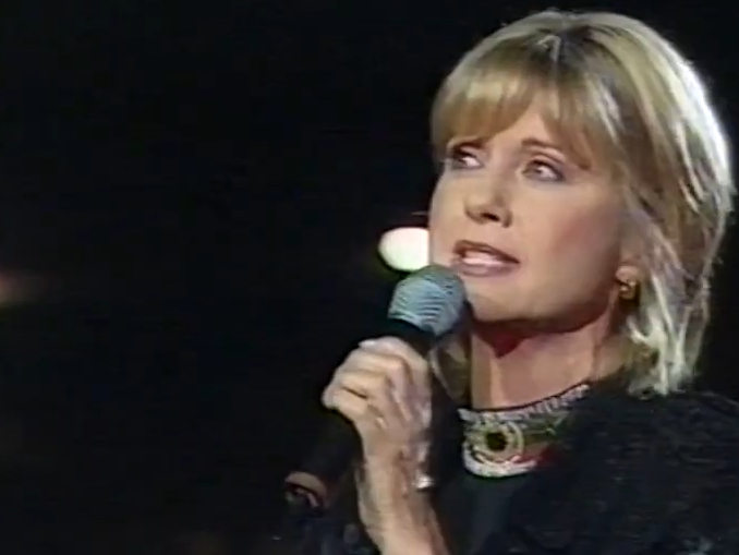Olivia Newton-John and Jon Stevens at Super League Cup Grand Final September 1997 Olivia Newton-John Super League Cup Grand Final September 1997